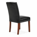 Chaise en bois et cuir synthétique noir avec clous décoratifs